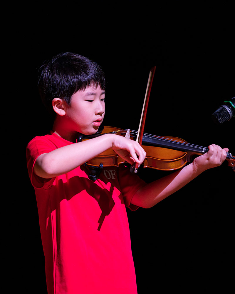 OFS Elementary School student playing violin