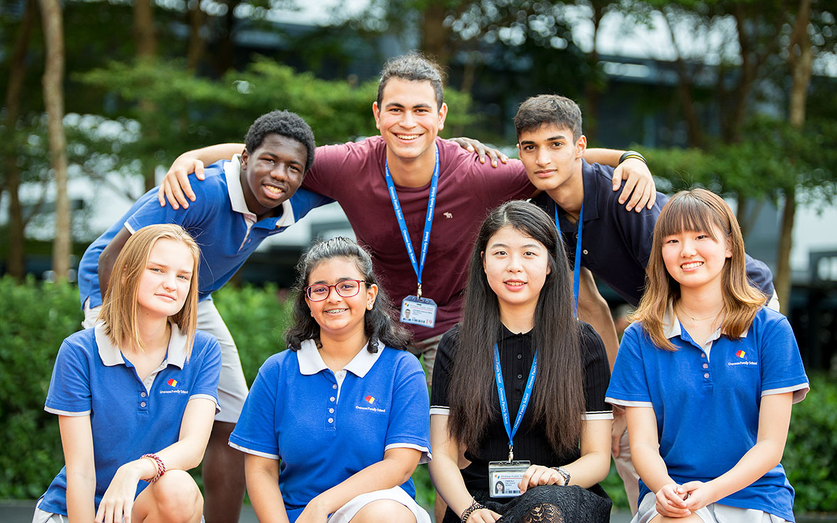 OFS Junior and Senior High School students in front of the OFS garden
